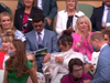 Priyanka Chopra, centre, adjusts her scarf as Kate and Prince William enter the Royal Box at Wimbledon.