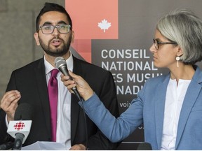 Members of the National Council of Canadian Muslims Mustafa Farooq, left, and Bochra Mana speak during a news conference in Montreal, Monday, June 17, 2019, where plans were outlined to lawfully challenge the Quebec government's Bill 21.