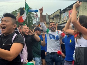 Soccer fans celebrate after Italy beat England on penalties to win Euro 2020, in the Little Italy neighbourhood of Toronto, Ontario, Canada July 11, 2021.