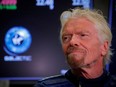 Sir Richard Branson stands on the floor of the New York Stock Exchange (NYSE) ahead of Virgin Galactic (SPCE) trading in New York, U.S., October 28, 2019.