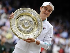 Australia's Ashleigh Barty holds the trophy after winning her final match against Czech Republic's Karolina Pliskova