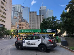 The scene outside the City Hall parking garage where Toronto Police officer Const. Jeffrey Northrup was killed early Friday morning.