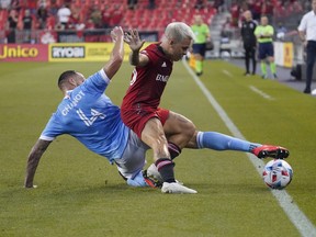 New York City FC defender Maxime Chanot and Toronto FC midfielder Yeferson Soteldo battle for the ball on Saturday night.