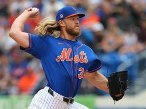 Pitcher Noah Syndergaard #34 of the New York Mets delivers a pitch against the Houston Astros during the first inning of a spring training baseball game at Clover Park on March 8, 2020 in Port St. Lucie, Florida.