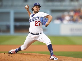 Trevor Bauer of the Los Angeles Dodgers throws the first pitch in the first inning against the San Francisco Giants at Dodger Stadium on June 28, 2021 in Los Angeles, California.