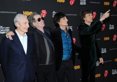 (L-R) Charlie Watts, Keith Richards, Ronnie Wood and Mick Jagger of The Rolling Stones attend "The Rolling Stones Crossfire Hurricane" premiere at Ziegfeld Theater on November 13, 2012 in New York City.