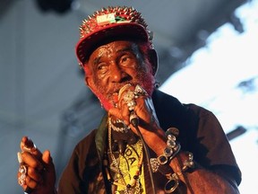 Musician Lee "Scratch" Perry performs onstage during day 1 of the 2013 Coachella Valley Music & Arts Festival at the Empire Polo Club on April 12, 2013 in Indio, California.