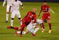 Toronto FC defender Laurent Ciman works for the ball against Atlanta United during a game last year.