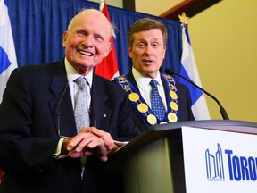 Former premier Bill Davis is pictured with Mayor John Tory in December 2014 at the first council meeting following that fall's municipal election.