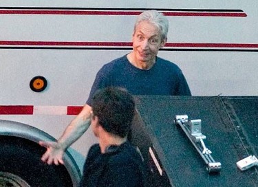 Charlie Watts of the Rolling stones makes his way to his trailer in front of Zaphod Beeblebrox, in the Byward market of Ottawa where the band filmed a video.