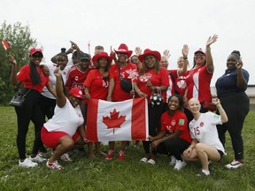 Relatives of the Canadian women's soccer team celebrate the gold medal win on Friday, Aug. 6, 2021.