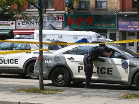 A shooting Sunday morning at Spadina Ave. and Nassau St. left two men dead and two others wounded.