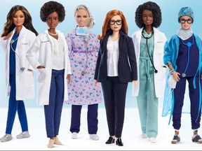 An undated handout image of a Barbie doll made in the likeness of Sarah Gilbert (3d R), the Oxford University professor who co-designed the Oxford/AstraZeneca vaccine, among a global lineup of women of health-care sector honoured with a one-of-a-kind doll.