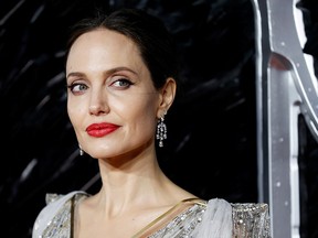 Angelina Jolie poses as she attends the U.K. premiere of "Maleficent: Mistress of Evil" in London October 9, 2019.