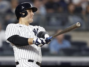 Anthony Rizzo of the New York Yankees hits a home run against the Baltimore Orioles during the fourth inning at Yankee Stadium on Aug. 4, 2021 in New York City.