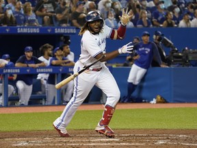 Toronto Blue Jays first baseman Vladimir Guerrero Jr (27) reacts after a fly ball to Chicago White Sox right fielder Brian Goodwin (not pictured) in the sixth inning at Rogers Centre Aug. 24, 2021.