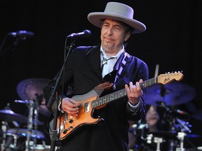 In this file photo taken on July 22, 2012, Bob Dylan performs on stage during the 21st edition of the Vieilles Charrues music festival in Carhaix-Plouguer, France.