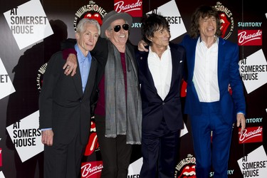 From left, Charlie Watts, Keith Richards, Ronnie Wood and Mick Jagger, from the British Rock band The Rolling Stones, arrive at a central London venue to mark the 50th anniversary of the Rolling Stones first performance, Thursday, July 12, 2012.