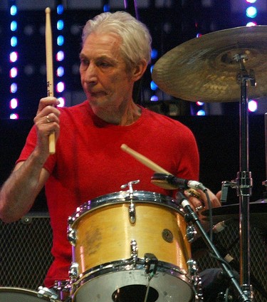 Rolling Stones drummer Charlie Watts performs in the background at their sold out show at the Saddledome Oct. 28, 2005.
