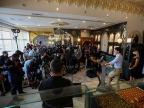 Liberal Leader Justin Trudeau speaks to the media at the Nafisa Middle Eastern Cuisine restaurant during his election campaign tour in Mississauga August 27, 2021.