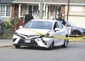 A 39-year-old male motorcyclist is dead after the bike he was riding southbound on Caledonia Rd. south of Lawrence Ave. West was clipped by a white Toyota (pictured) travelling northbound and making a left-hand turn into the oncoming motorcycle. JACK BOLAND/TORONTO SUN