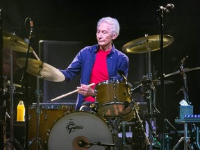 In this file photo taken July 28, 2019, Rolling Stones drummer Charlie Watts performs on stage during their "No Filter" tour at NRG Stadium in Houston.
