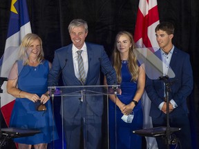 Nova Scotia Progressive Conservative Leader Tim Houston, flanked by his wife Carol, daughter Paget and son Zachary, left to right, addresses supporters after winning a majority government in the provincial election at the Pictou County Wellness Centre in New Glasgow, N.S. on Tuesday, Aug. 17, 2021.