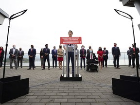 Liberal Leader Justin Trudeau holds a campaign event in downtown Vancouver, B.C., on Wednesday, Aug 18, 2021. He is backdropped by Liberal candidates.