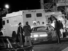 In this Oct. 21, 1981, file photo, police are at the scene of a Brinks armored truck robbery at the Nanuet Mall in Nanuet, N.Y., where multiple Nyack police officers and a Brinks guard were killed earlier during the robbery.