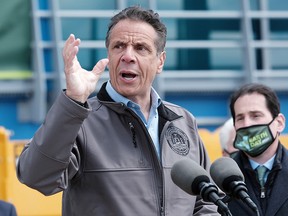 New York Governor Andrew Cuomo gestures as he speaks during a ground-breaking ceremony at the Bay Park Water Reclamation Facility, in East Rockaway, New York, April 22, 2021.