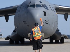 Royal Canadian Air Force C-17 Globemaster parks after touching down at Toronto Pearson International Airport on Wednesday, evacuating citizens in danger for helping the Canadian military during their mission in Afghanistan.