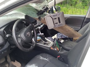 Wellington OPP are looking to identify the driver of a pickup truck that lost a wooden plank that ended up flying through the windshield of an SUV on July 30