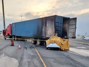 Scene of deadly crash in the eastbound express lanes of Hwy. 401 near Dufferin St.  An eastbound car collided with a disabled transport truck stopped in the live lanes of the highway.