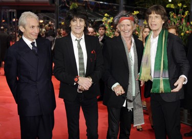 Rolling Stones members (L-R) Charlie Watts, Ron Wood, Keith Richards and frontman Mick Jagger pose on the red carpet at the Berlinale palace ahead of the screening of their movie "Shine a light" by director Martin Scorsese on the opening night of the Berlin Film Festival on February 7, 2008 in Berlin.