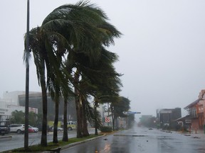 Debris is seen on the road after Storm Grace made landfall on the Yucatan Peninsula, in Cancun, Mexico, August 19, 2021.