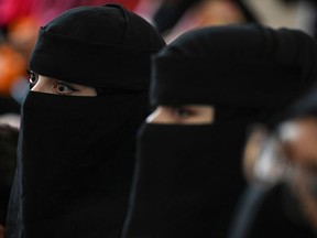 Afghan women take part in a gathering at a hall in Kabul on August 2, 2021 against the claimed human rights violations on women by the Taliban regime in Afghanistan.