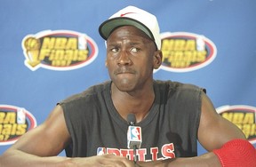 Guard Michael Jordan of the Chicago Bulls speaks reporters during a practice before a playoff game against the Utah Jazz at the Delta Center in Salt Lake City, Utah.