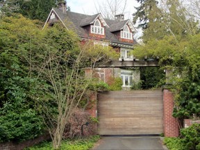 This photo taken on April 1, 2014 shows the house in Seattle, Wash., where Nirvana frontman Kurt Cobain committed suicide Nirvana fans prepare to mark the 20th anniversary of Cobain's suicide on April 5.