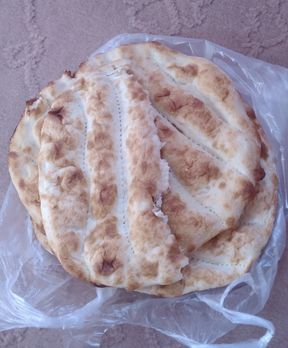 Afghan bread shared with a former interpreter who aided Canada during the war and is now in hiding in Kabul with his family. (Supplied)