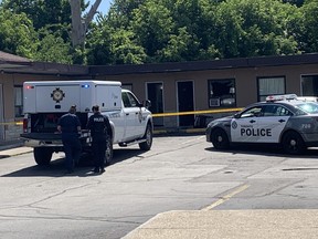 Office of the Fire Marshal and Toronto Police at the scene of a fatal fire at Roycroft Motel on Kingston Rd. in Scarborough on Aug. 2, 2021.