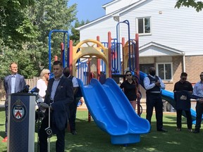 Crime Stoppers Chairman Sean Sportun speaks at Thursday’s opening of a new playground where two girls were shot in the summer of 2018.