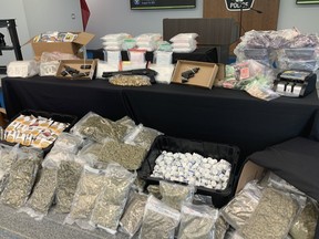 Contraband seized during drug investigation Project Icaraus are displayed at Halton Regional Police headquarters on Wednesday, Aug. 18, 2021.