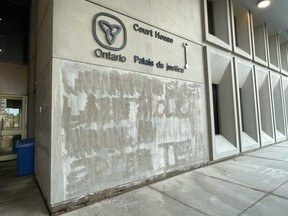 Graffiti painted on a wall at the London Courthouse on Queens Avenue had already been removed by early Wednesday morning. Photo taken Aug. 25, 2021.