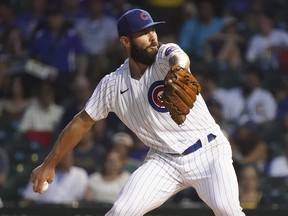 Jake Arrieta of the Chicago Cubs throws a pitch against the Milwaukee Brewers at Wrigley Field on August 11, 2021 in Chicago.