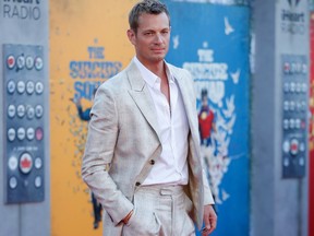Cast member Joel Kinnaman poses at the premiere for the film "The Suicide Squad" in Los Angeles August 2, 2021.