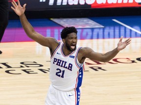 Philadelphia 76ers centre Joel Embiid reacts after scoring against the Atlanta Hawks during the first quarter of Game 7 of the second round of the 2021 NBA Playoffs at Wells Fargo Center in Philadelphia, June 20, 2021.
