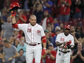 Cincinnati Reds first baseman Joey Votto (19) reacts after getting his 2000th career hit against the Chicago Cubs at Great American Ball Park.