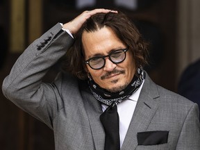 Johnny Depp arrives at the Royal Courts of Justice, Strand on July 13, 2020 in London, England.