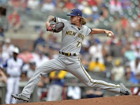 Josh Hader of the Milwaukee Brewers pitches against the Atlanta Braves at Truist Park on August 1, 2021 in Atlanta.