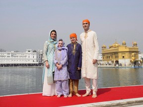 Prime Minister Justin Trudeau, wife Sophie Gregoire Trudeau, and children, Xavier, 10, Ella-Grace, 9, visit the Golden Temple in Amritsar, India on Wednesday, Feb. 21, 2018. The national security and intelligence committee of parliamentarians has delivered a special report to Justin Trudeau on the prime minister's ill-fated trip to India.